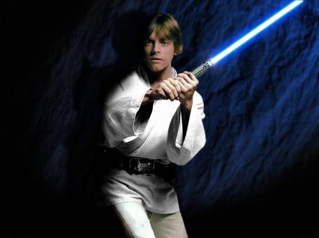 Luke Skywalker holding Blue Lightsaber